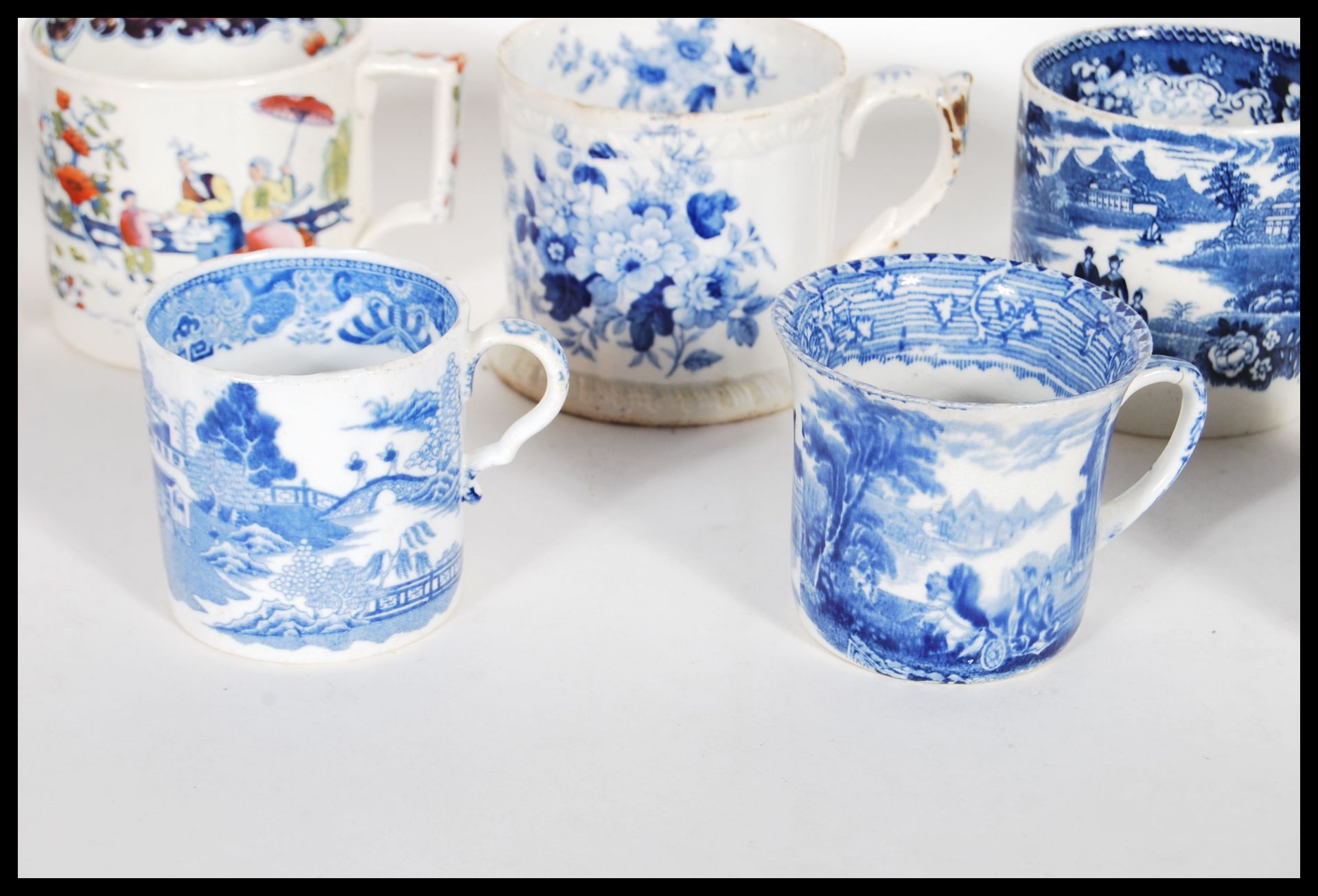 A collection of 19th Century Victorian Staffordshire mugs and cups, most having blue and white - Bild 2 aus 13