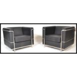 After Le Corbusier - A pair of  'LC2 ' type black vinyl leather and chrome club chair. The