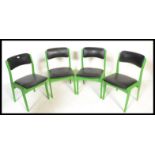 A set of four retro 20th Century Danish inspired dining chairs, upholstered seat pads and