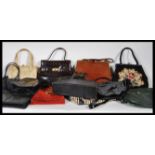 A collection of ladies handbags to include snakeskin examples, Jaeger, Liberty, Dunhill, Beadwork,
