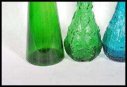 Empoli glass - A group of four vintage retro Genie bottle decanters to include two green bottles
