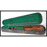 An Antique 19th Century Violin musical instrument having a two piece maple back with spruce front.