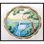 A late 19th/ early 20th Century Art Nouveau ceramic card / pin tray, having an enamelled scene of
