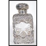 A 19th Century silver hallmarked mounted cut glass square decanter with star-cut sides and base by