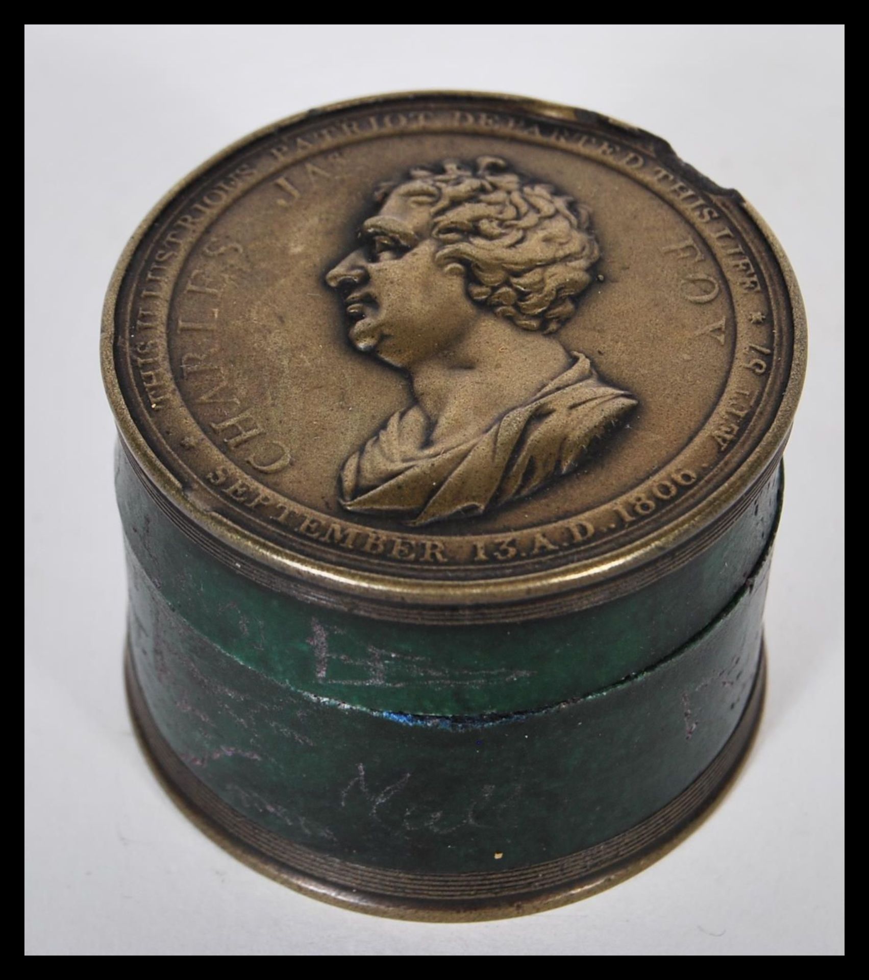 Politics - a 19th Century circular ebony and medallic snuff box, commemorating the life of Charles