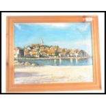 A 20th Century oil on canvas landscape painting depicting a bay with a mediterranean town behind