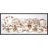 A Royal Albert Old Country Roses tea service consisting of cups, saucers, side plates, sugar bowl