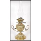 A vintage early 20th Century brass oil lamp titled ' The Hicks No2 ', the brass lamp of bulbous form