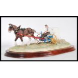 A Border Fine Arts limited edition 626/950 figure, model 'Rowing Up' by Ray Ayres. Raised on a