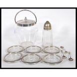 A small group silver plate items to include, a 1930's WMF biscuit barrel having glass body and