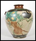 A large early 20th Century 1920's Japanese stoneware vase of bulbous form having hand painted