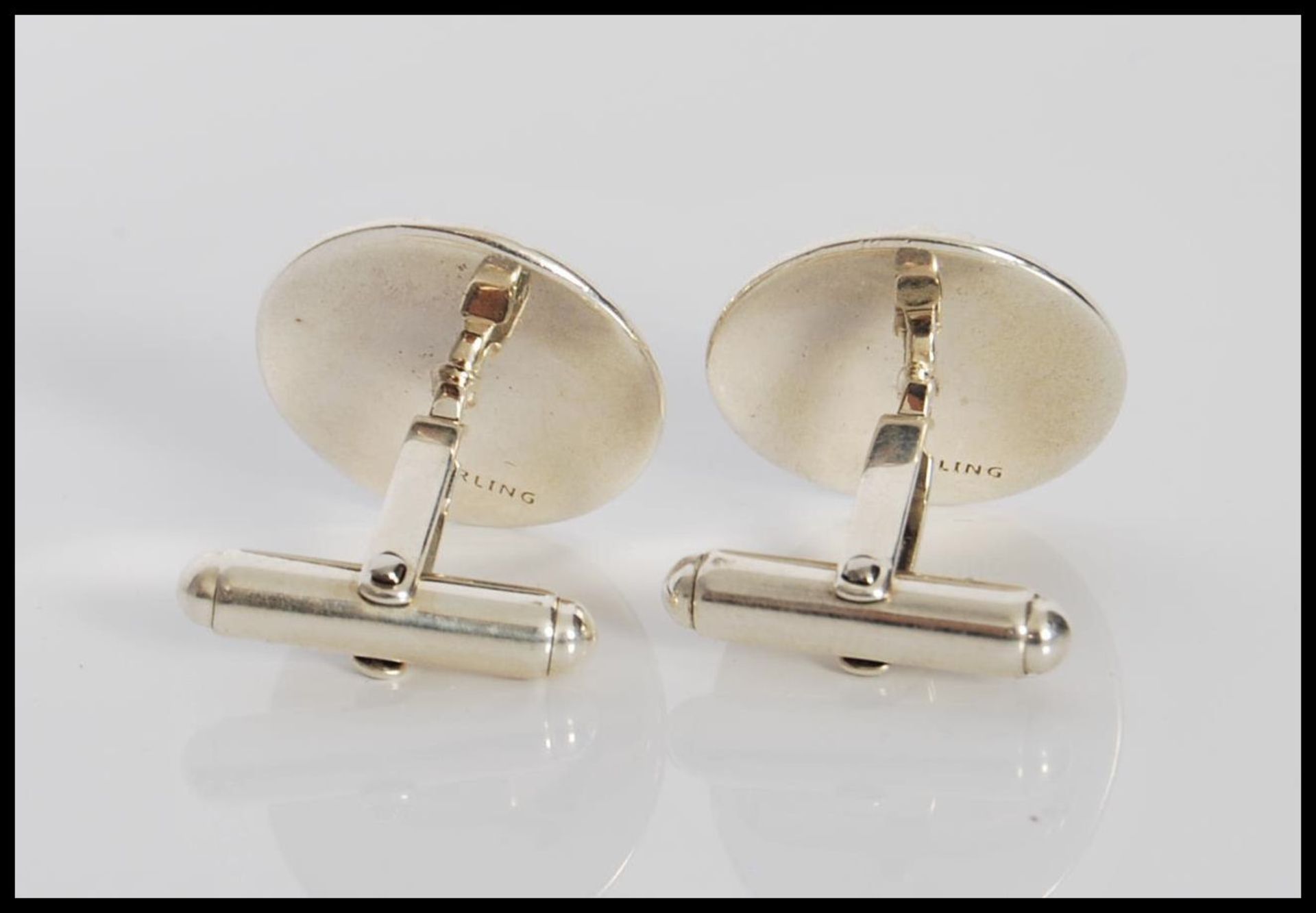 A pair of Versace style stamped sterling silver gentleman's cufflinks in the form of lion heads, - Bild 3 aus 4
