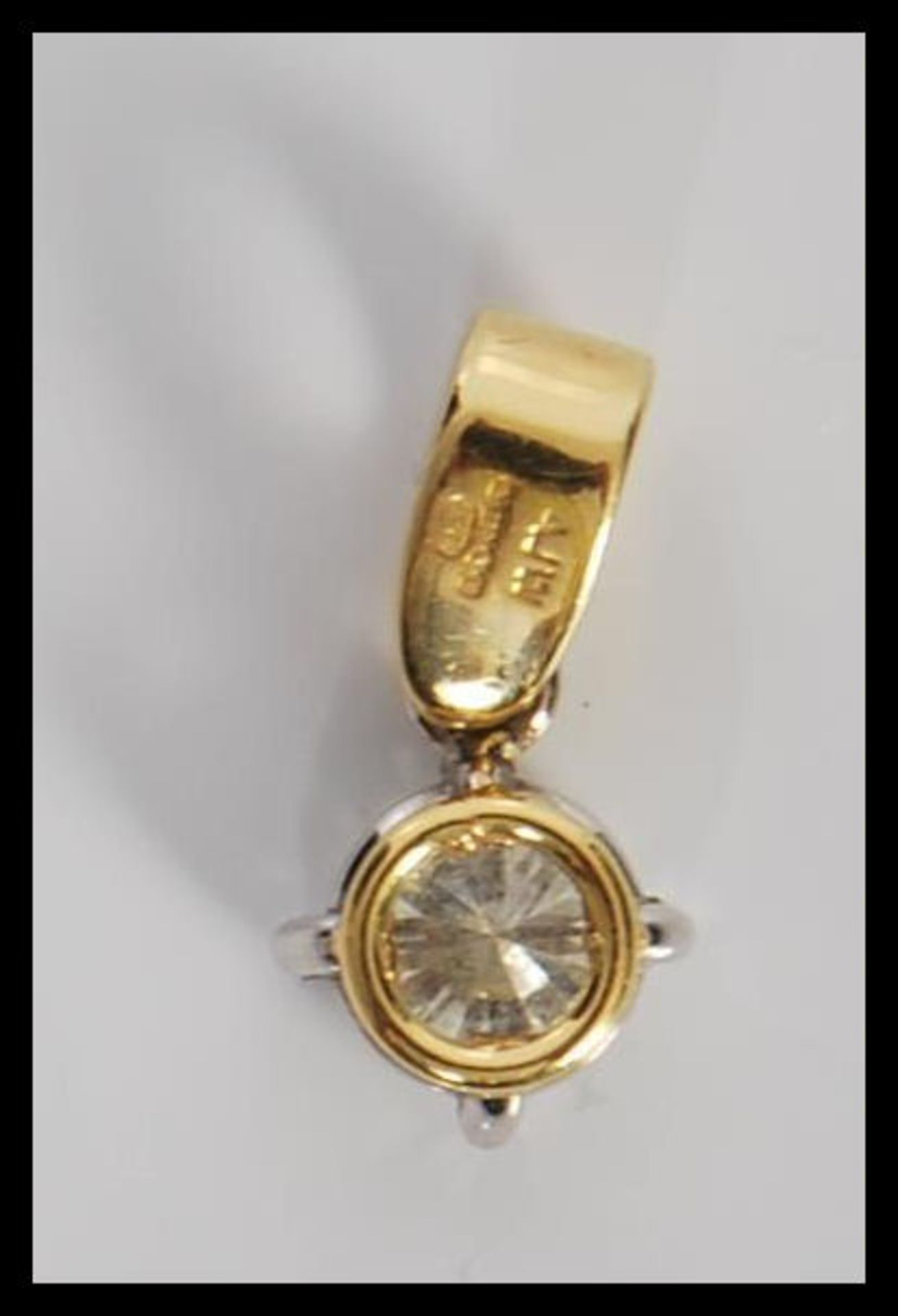 A 20th Century diamond pendant having a hallmarked 18ct gold bale set with a brilliant cut diamond - Bild 5 aus 5