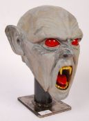 UNUSUAL VAMPIRE HEAD FAIRGROUND PROP.