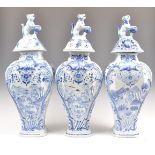 A SET OF THREE ANTIQUE DELFT BLUE AND WHITE JARS A