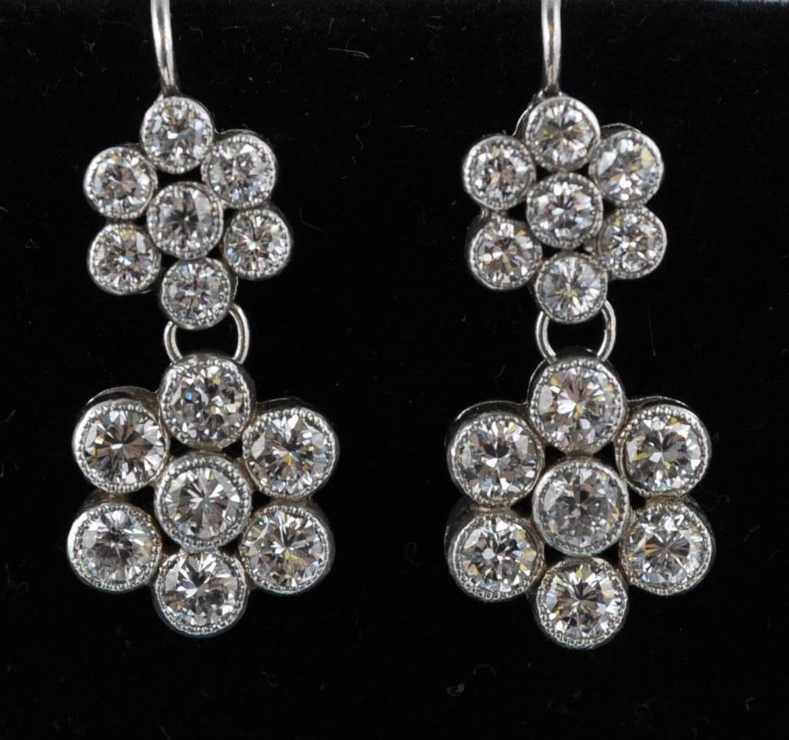 A pair of 18ct white gold and diamond earrings. Th - Image 2 of 3