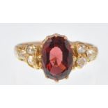 18CT GOLD ALMONDINE GARNET AND DIAMOND RING