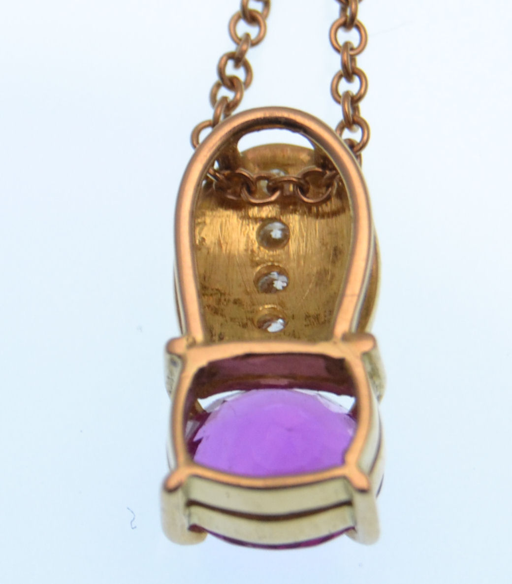 A pink sapphire and diamond pendant, the oval ston - Image 4 of 5