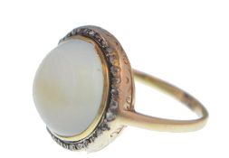 A 19th century gold diamond and quartz ring. The r