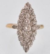 A HALLMARKED 18CT GOLD AND DIAMOND NAVETTE SET RIN