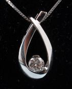 A 10ct white gold and diamond necklace and pendant