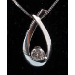 A 10ct white gold and diamond necklace and pendant