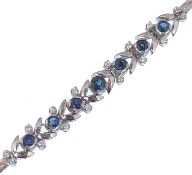 A French white gold sapphire and diamond bracelet.