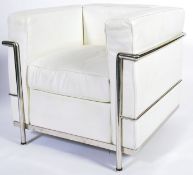 AFTER LE CORBUSIER A CONTEMPORARY LC2 LEATHER AND CHROME ARMCHAIR