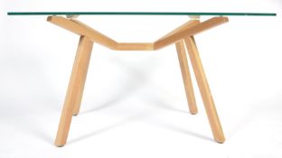 A CONTEMPORARY OAK AND GLASS DINING TABLE BY SEAN DIX