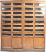 A PAIR OF LARGE MID 20TH CENTURY HABERDASHERY CABINETS