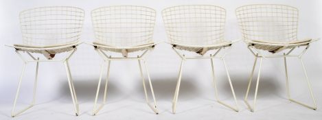 A SET OF FOUR BE49 WIRE WORK DINING CHAIRS BY HARRY BERTOIA