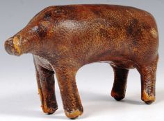 LIBERTY OF LONDON LEATHER CLAD MODEL OF A PIG BY DIMITRI OMERSA