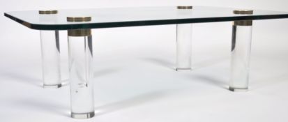 LARGE GLASS LUCITE AND BRONZE OCCASIONAL TABLE BY KARL SPRINGER.