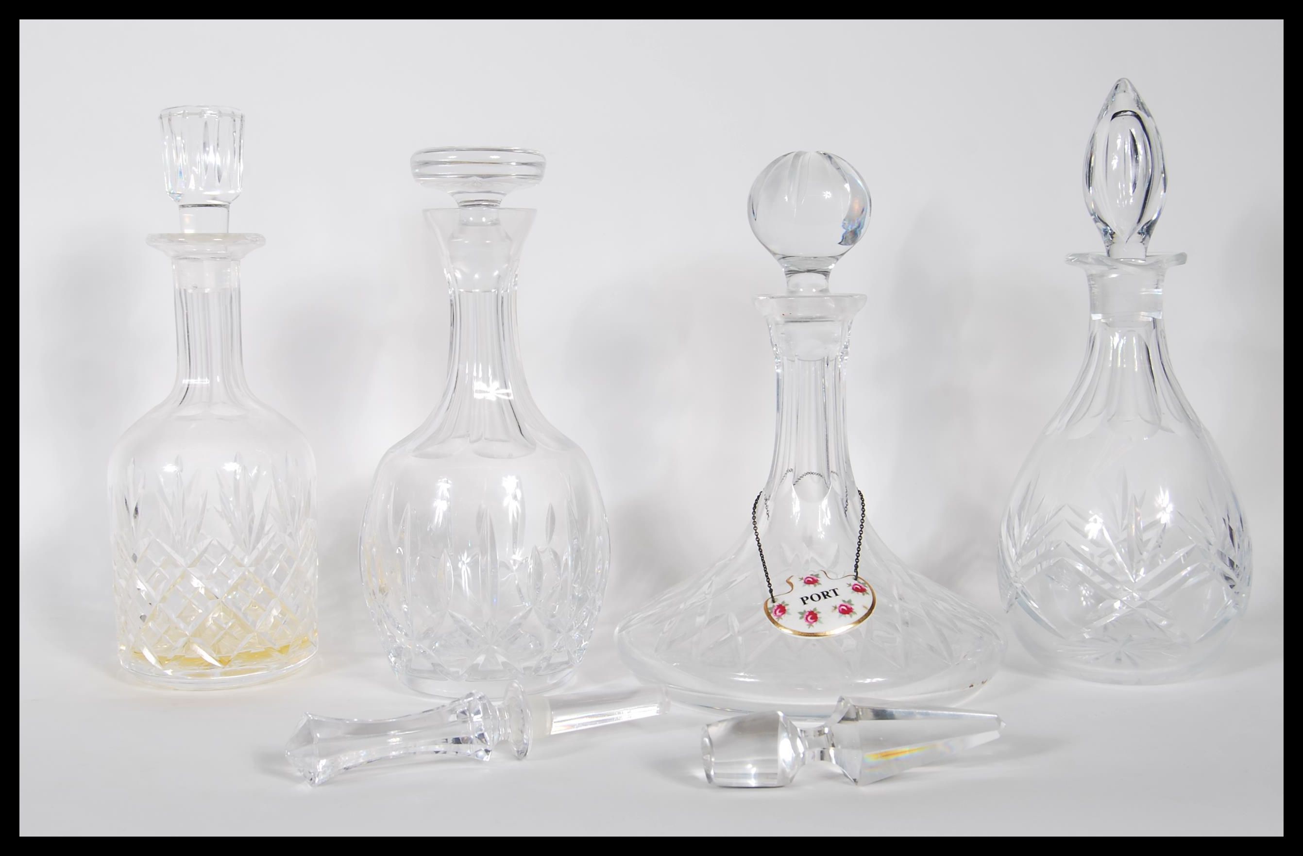 A group of 20th Century cut crystal glass decanter