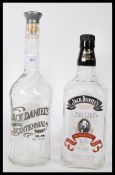 Jack Daniels two collectors whiskey bottles to inc