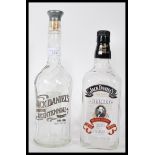 Jack Daniels two collectors whiskey bottles to inc