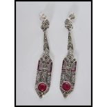 A pair of silver Art Deco style drop earrings of l
