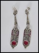 A pair of silver Art Deco style drop earrings of l