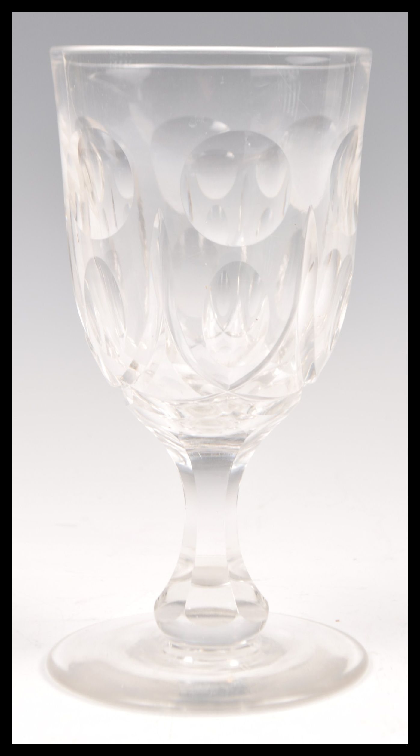 A large 19th Century faceted glass wine glass of t