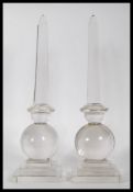 A pair of 20th Century glass obelisk centrepiece o