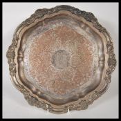 A silver plate on copper centrepiece tray having a