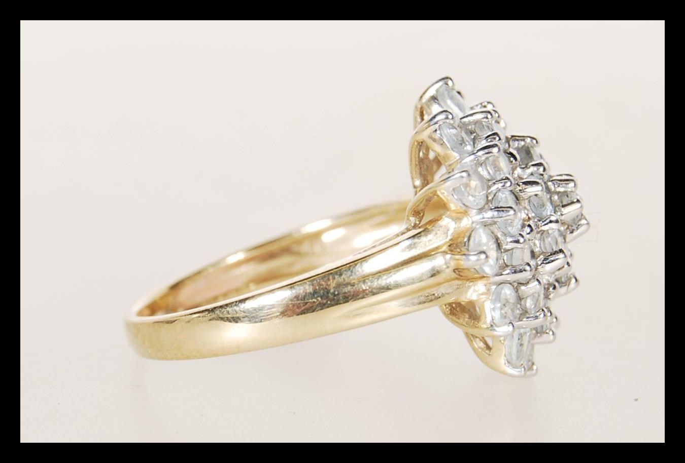 A hallmarked 9ct gold cluster ring being set with - Image 2 of 5