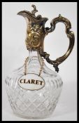 A early 20th Century silver plated claret jug, hav