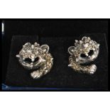 A pair of silver and marcasite designer earrings i