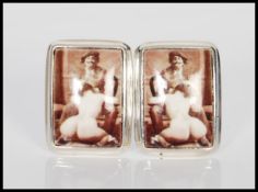 A pair of sterling silver and enamel cufflinks dep