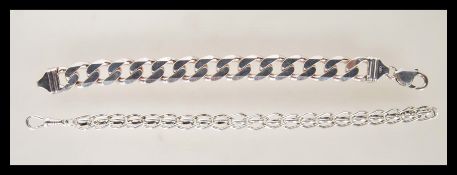 A stamped 925 silver flat link bracelet having a l