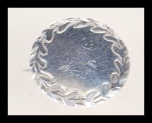 A silver hallmarked brooch fashioned from a Georgi