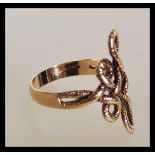 A 1970's hallmarked 9ct gold ring having a knot de