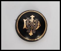 A 19th Century Victorian jet mourning brooch of ro
