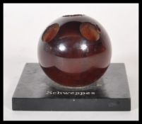 A vintage Schweppes pub advertising pen holder hav